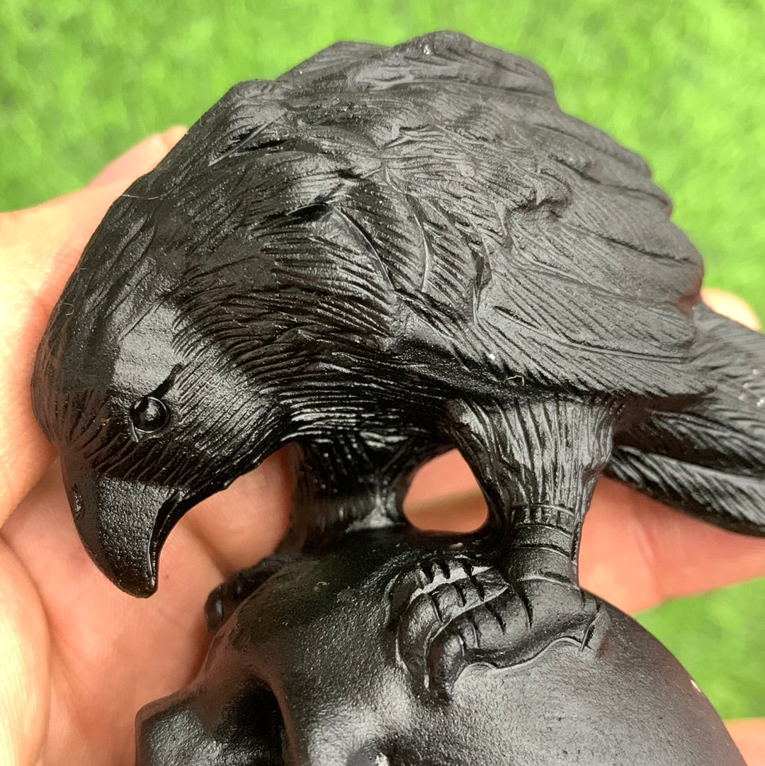 Crow and skull carvings