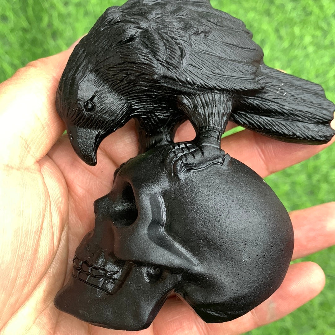 Crow and skull carvings