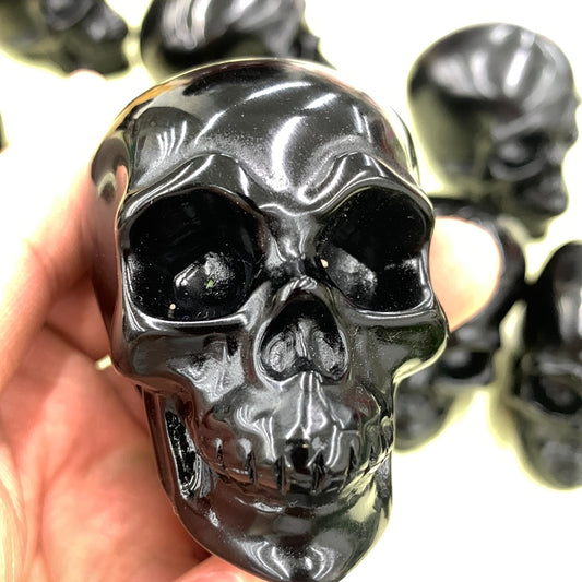 Obsidian skull carvings