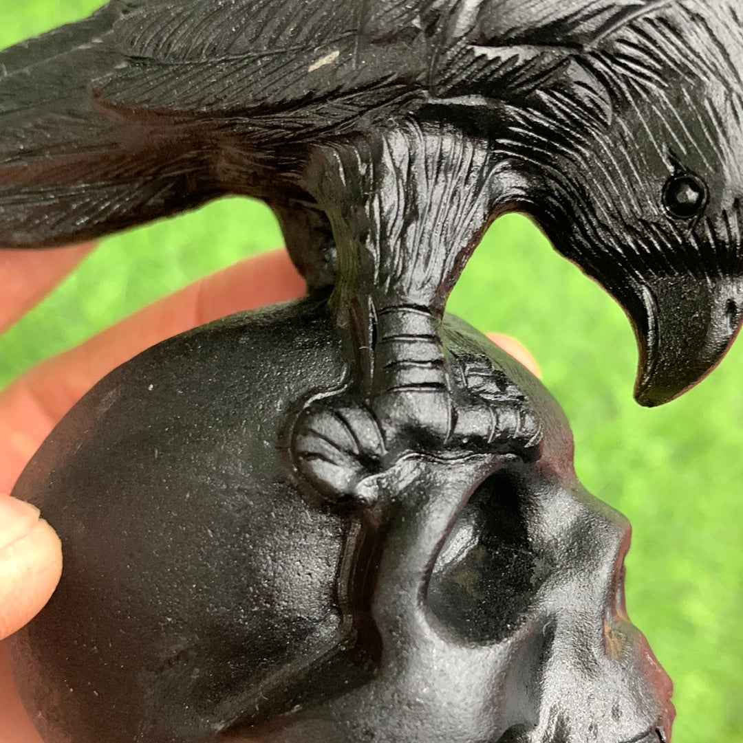 Crow and skull carvings